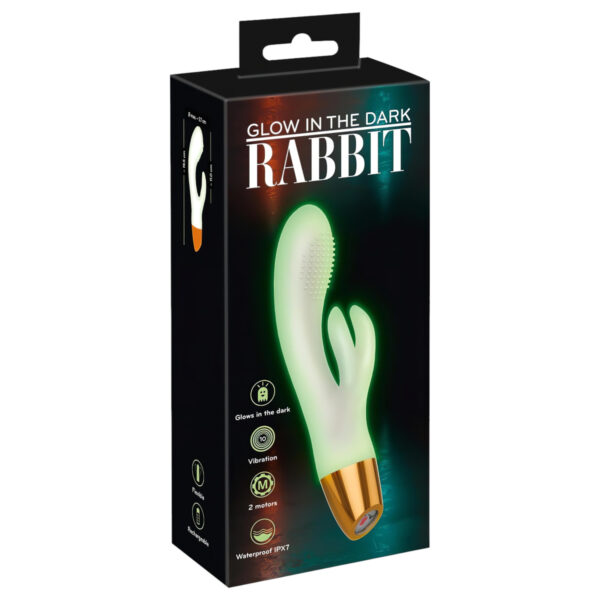 You2Toys Glow - svítící vibrátor s klitorálního ramenem (bílý)